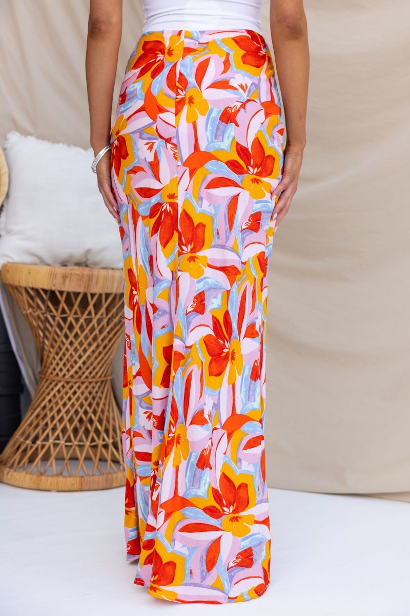 Back view of Heartful Maxi Skirt featuring vibrant floral print, perfect for stylish summer outfits.