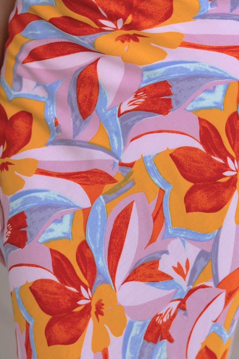 Floral print design on Heartful Maxi Skirt featuring vibrant colors and intricate flower patterns.