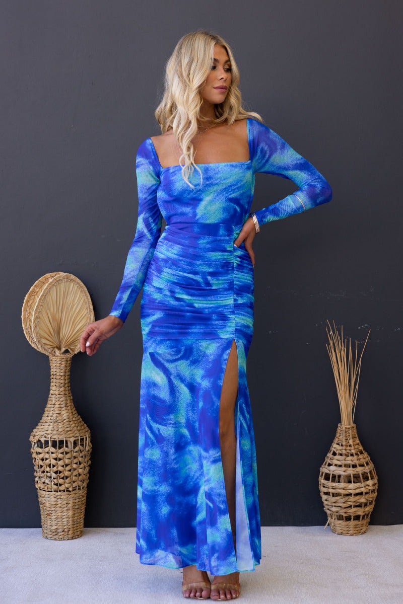 Keziah Multi-colour Maxi Dress with cross-over tie back, ruching, and high split, styled against a neutral background.