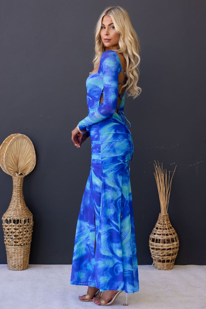 Keziah Maxi Dress in blue tie-dye print, featuring cross-over back, high split, and ruching at waist.