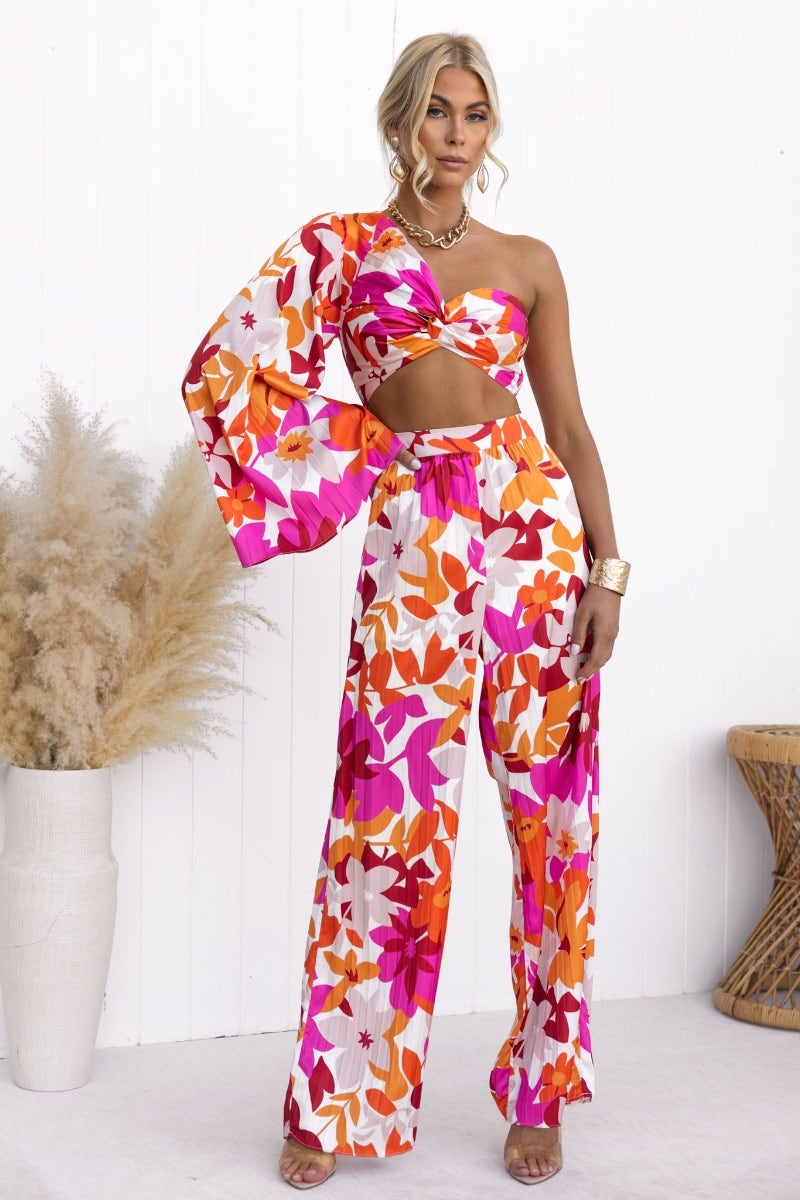Kira Set: Floral print one-shoulder top with twist detail and wide sleeve, paired with matching high-thigh non-stretch pants.
