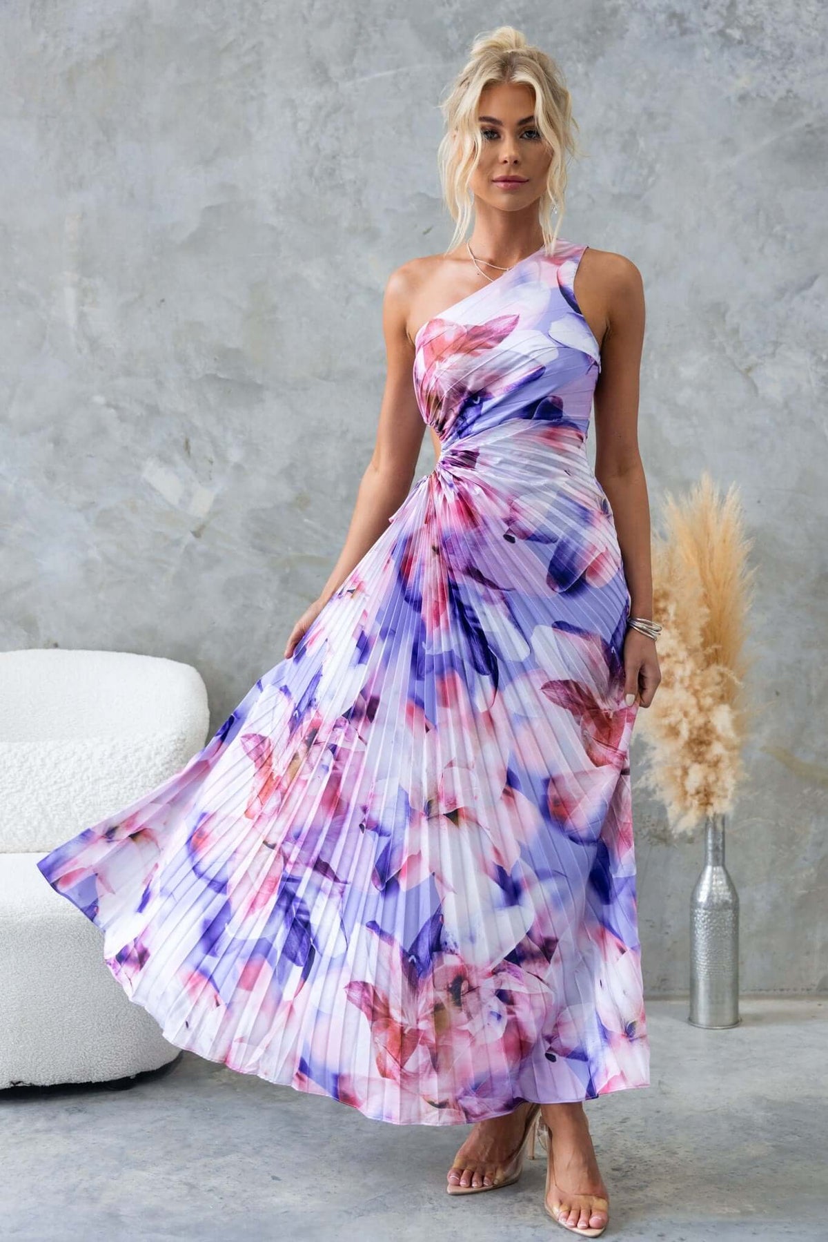 Ottile Maxi Dress in floral print featuring one-shoulder neckline, cut-out waist, and accordion pleat style.