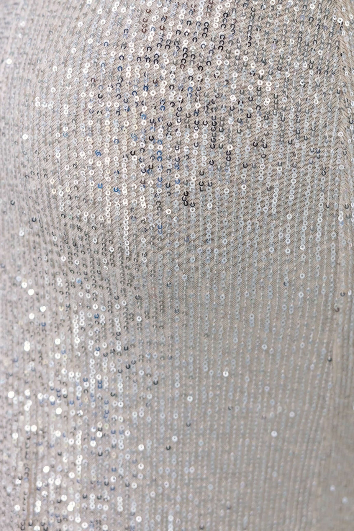 Close-up of Kileen Maxi Dress featuring shimmering sequins in a stylish design, enhancing its elegant appearance.
