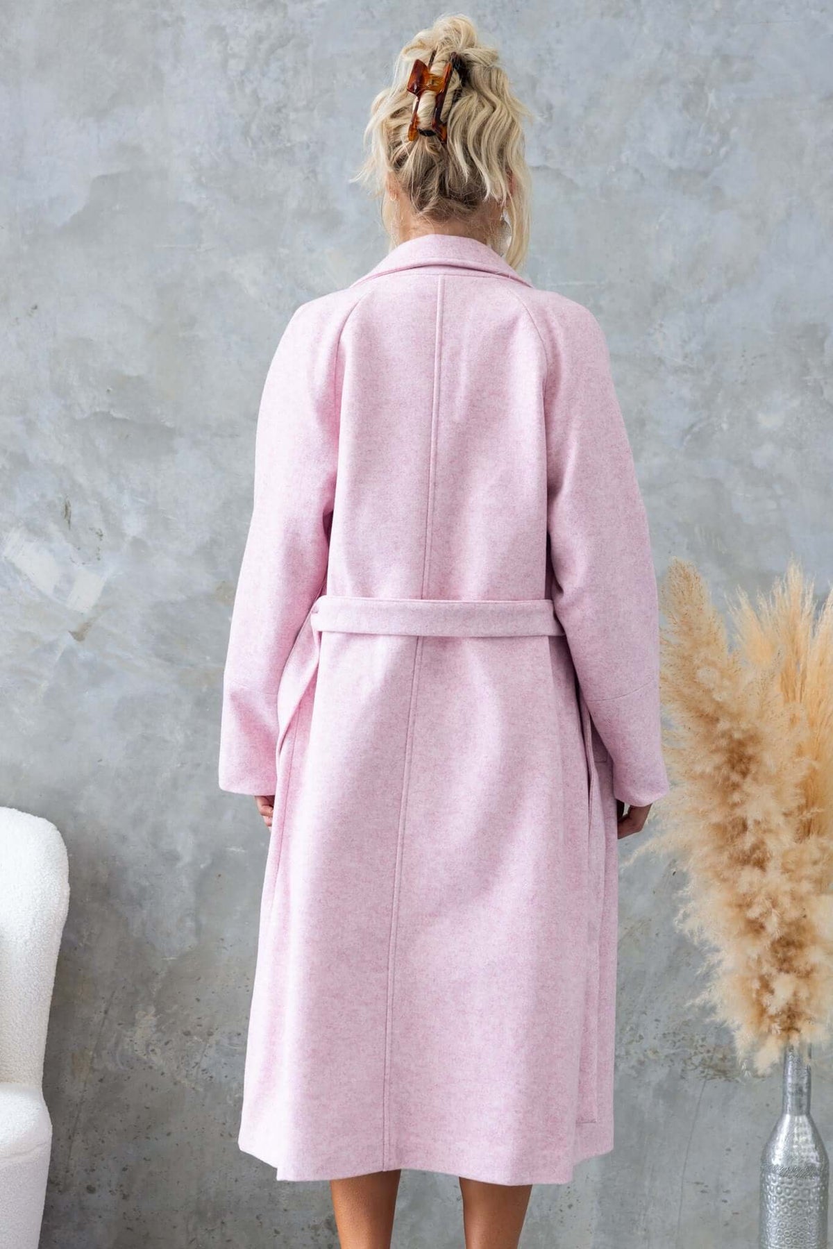 Back view of Jensen Coat in soft pink, featuring a longline fit, collar, lapel, and removable fabric tie.