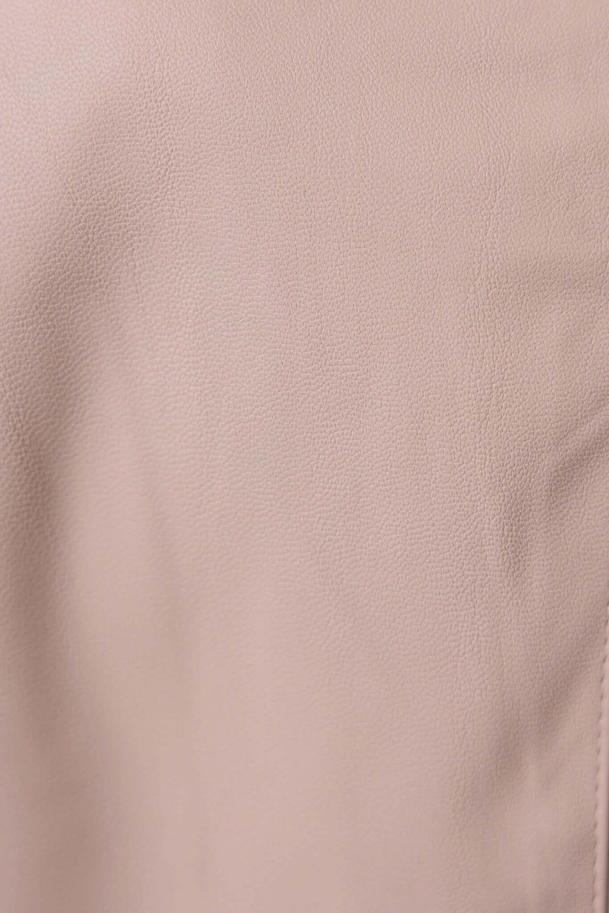 Close-up of faux leather fabric in soft beige, showcasing texture for Udine Midi Skirt.