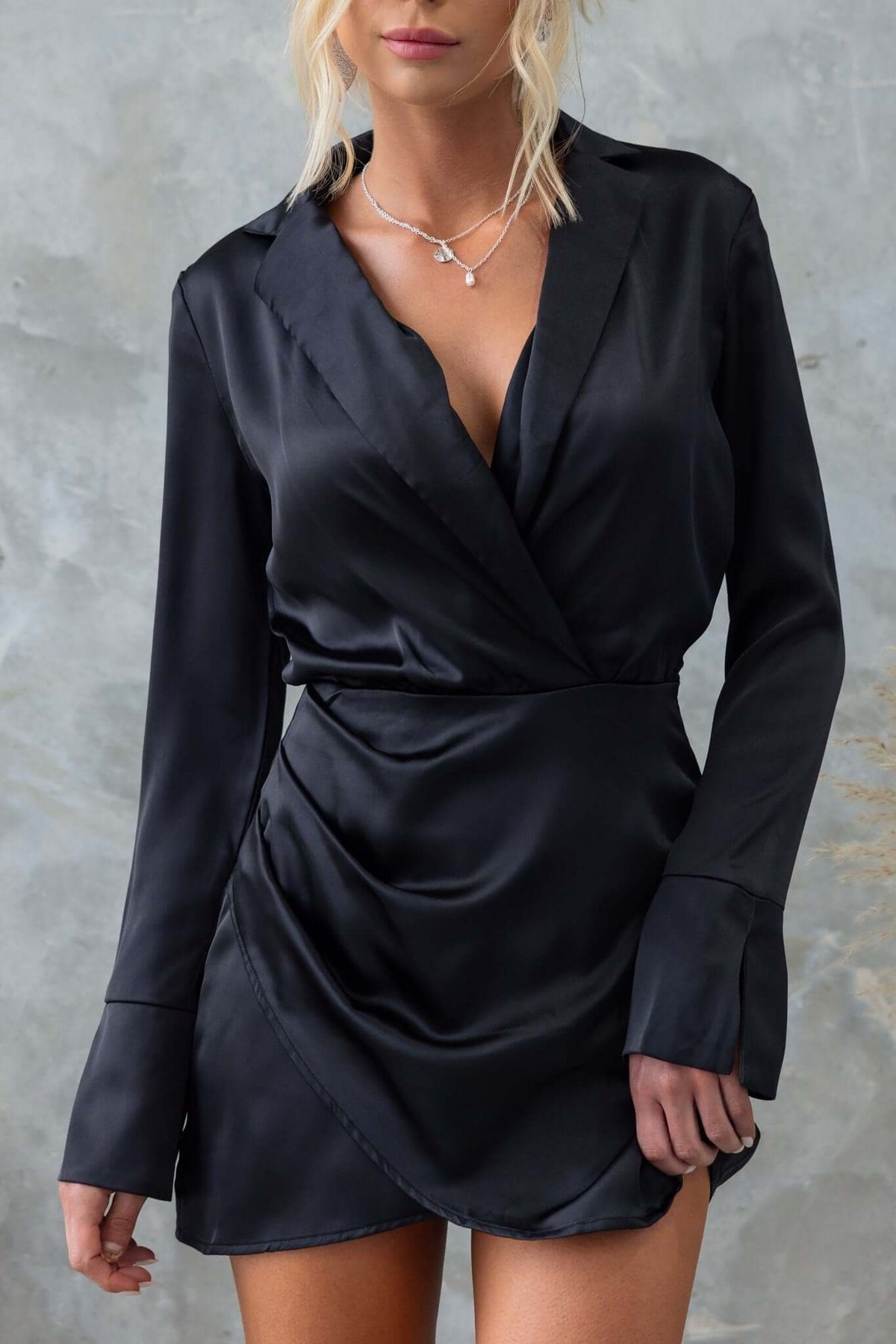 Vallejo Dress: Elegant black satin dress with collar, asymmetric hemline, and invisible zip on the side.