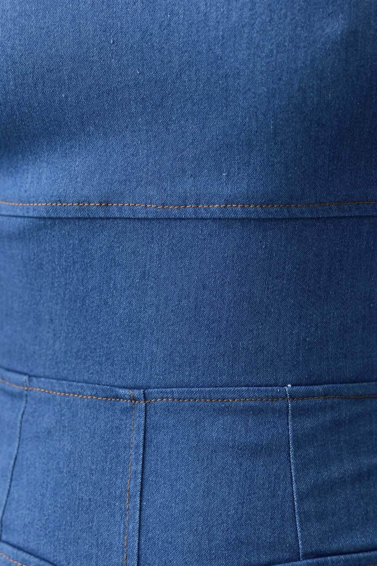 Close-up of Jovan Denim Midi Dress showcasing fabric texture and detailed stitching.