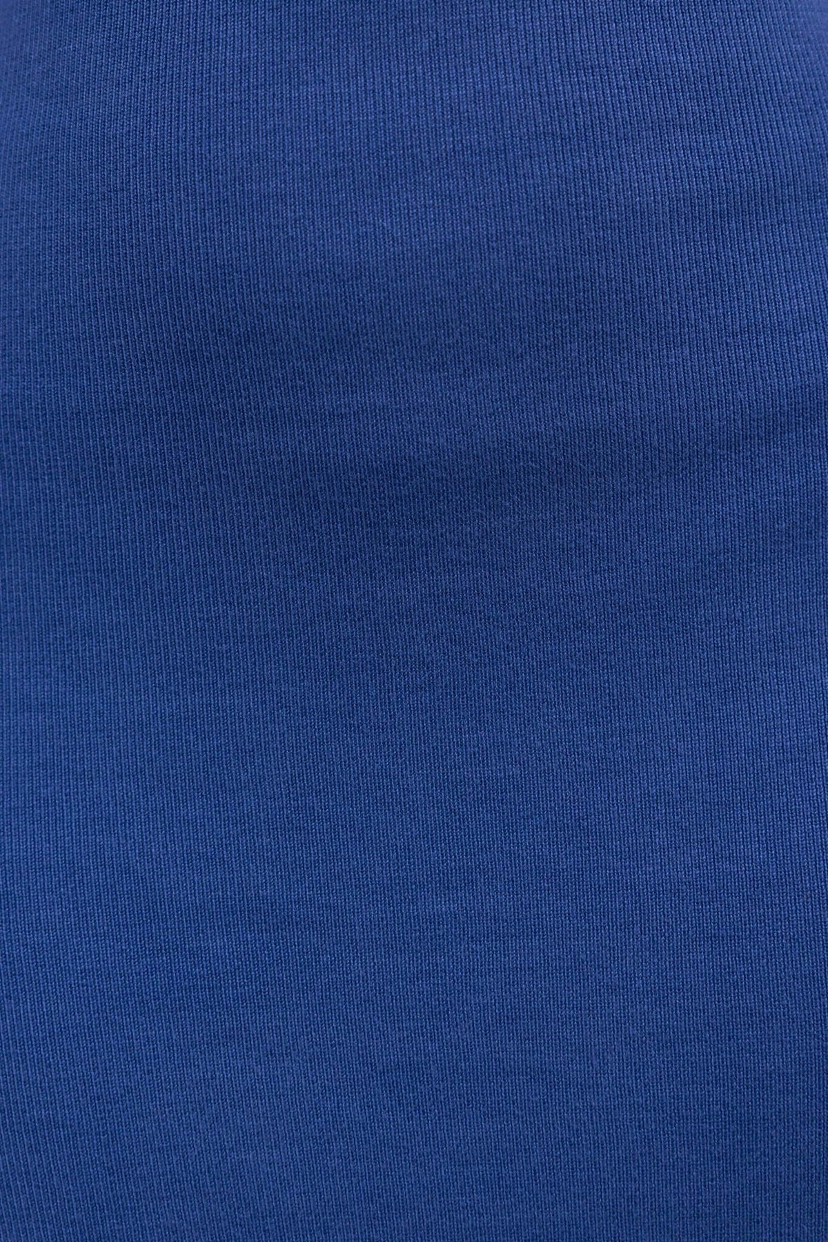 Close-up of blue ribbed knit fabric for the Quita Midi Dress, showcasing its texture and stretchiness.