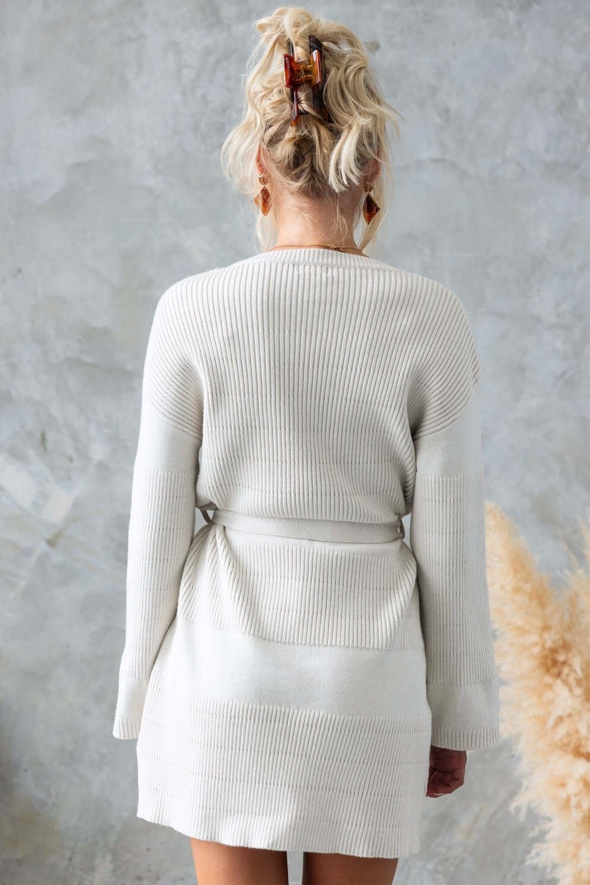 Back view of Wheaton Dress showing ribbed knit material and removable tie detail, perfect for a relaxed fit.