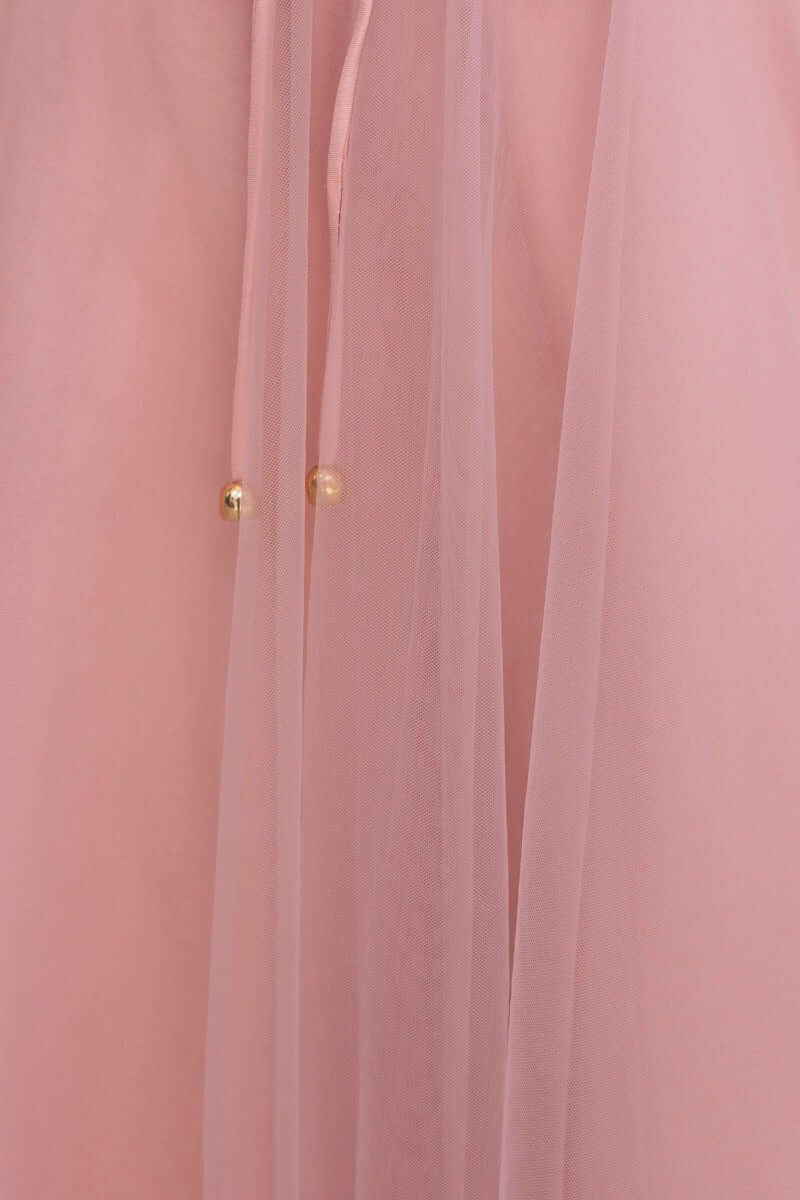 Close-up of pink tulle fabric with gold bead detail from the Wash Away Maxi Dress, showcasing its delicate design.