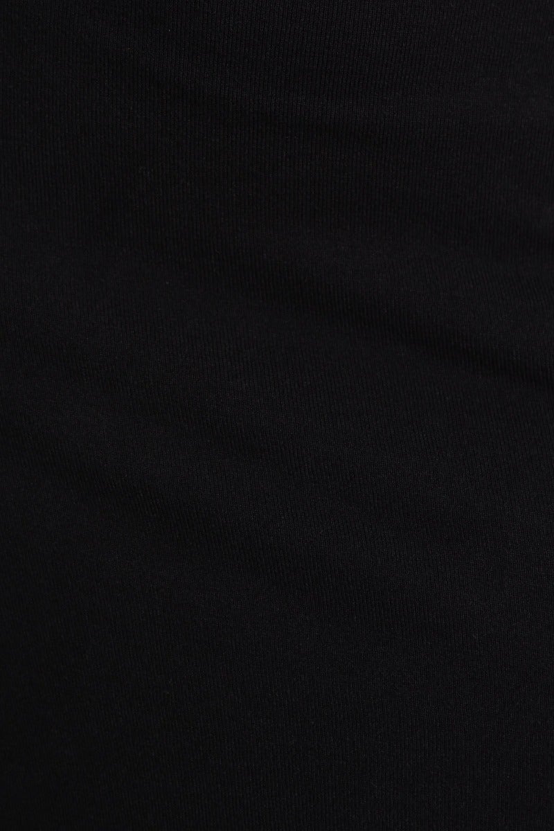 Close-up of black ribbed knit fabric texture used in Alisia Midi Dress.