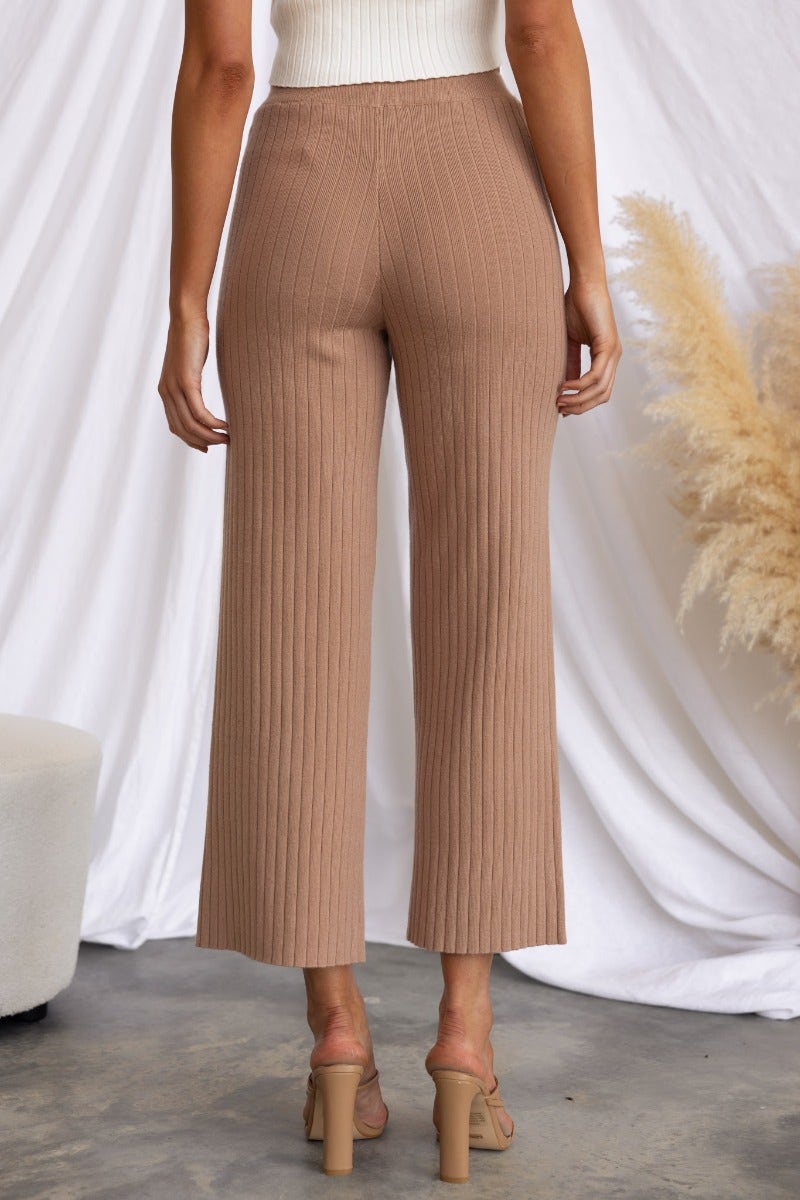 Back view of Etta Pants in ribbed knit with wide legs and elastic waistband, styled for a casual look.
