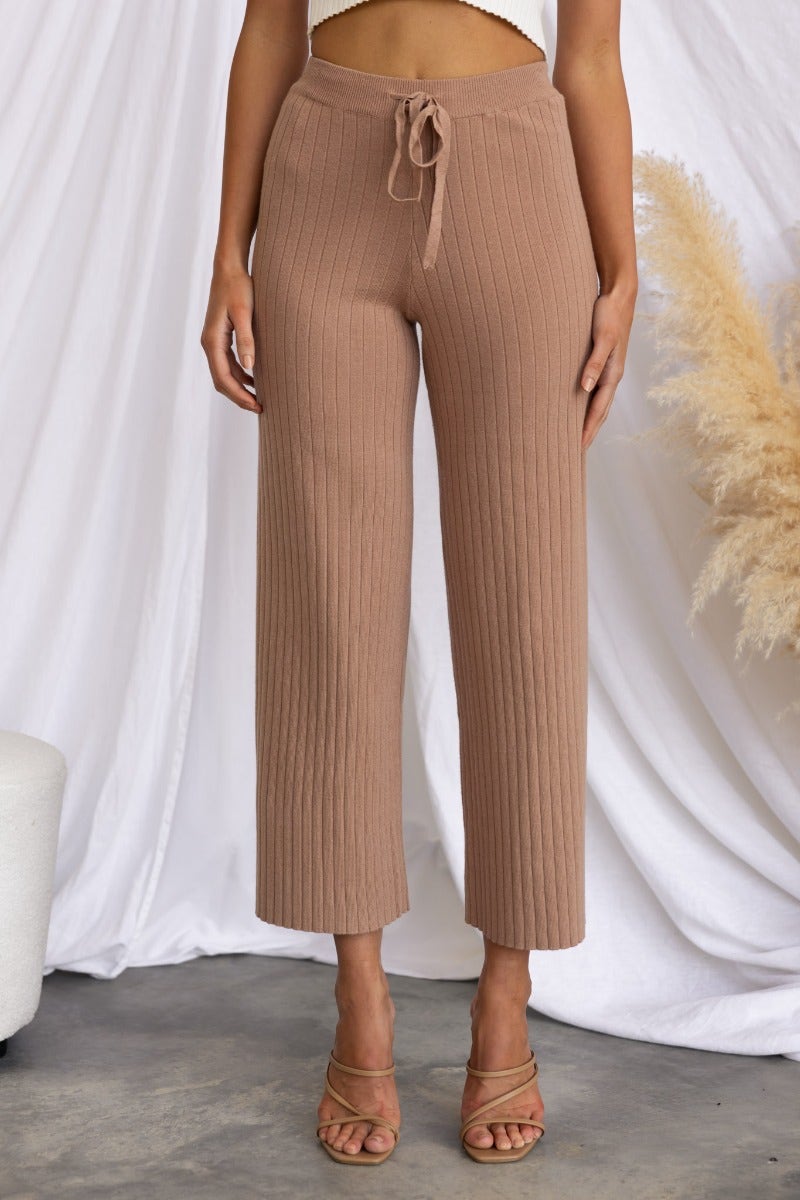 Etta Pants: Ribbed knit wide-leg pants with adjustable drawstring, perfect for a casual yet stylish look.