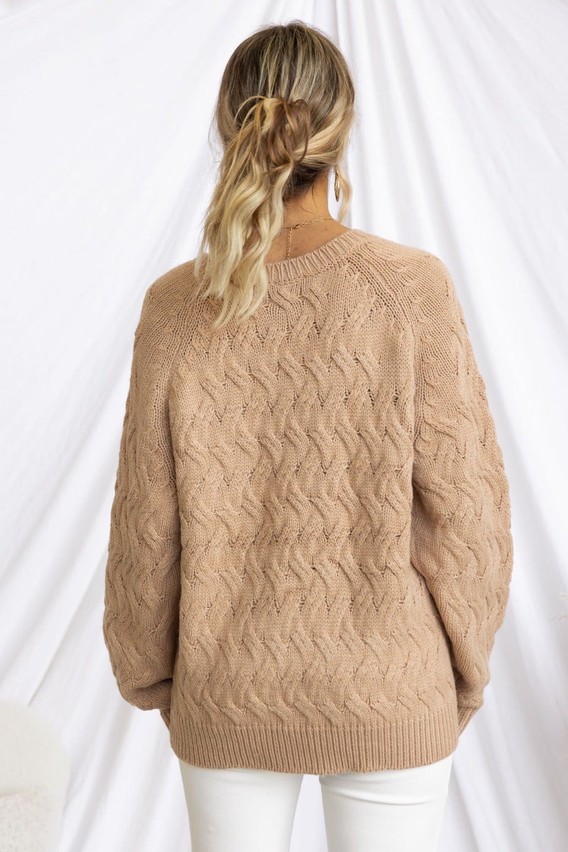 Renee Jumper in soft beige cable knit, featuring a round neckline and relaxed fit, perfect for casual wear.