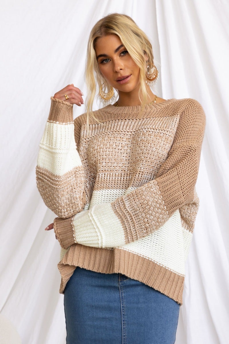 Stylish Burma jumper with round neckline and stretch fit, featuring beige and cream knitted design.