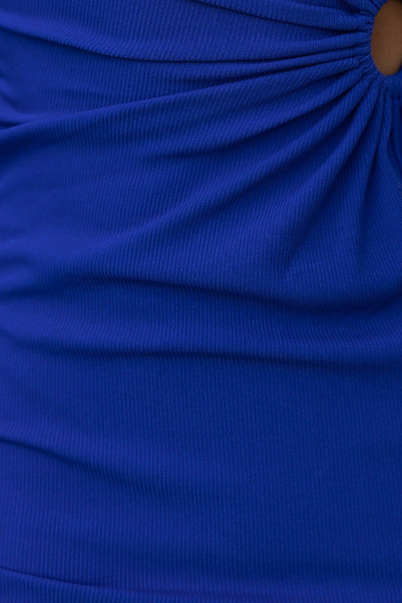 Close-up of ribbed blue fabric showcasing the one-shoulder design and cut-out waist detail of the Have Time Midi Dress.