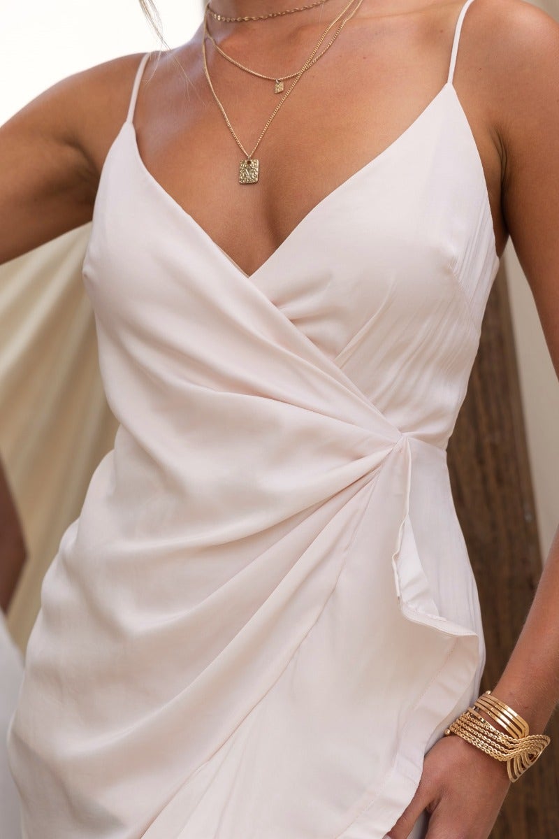 Brooks Midi Dress featuring adjustable spaghetti straps and stylish frill detail, perfect for a chic look.