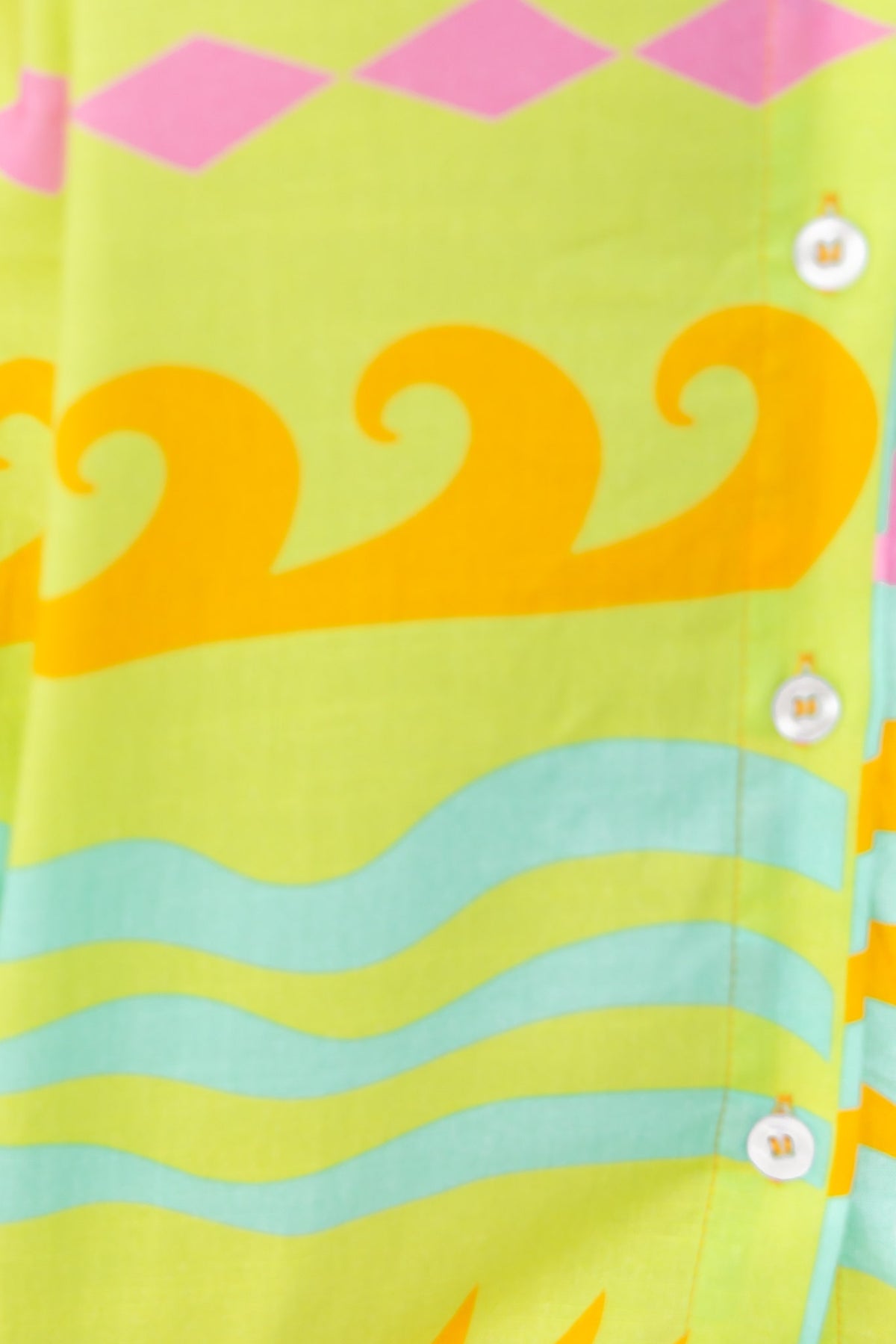 Colorful Verney Shirt featuring vibrant wave patterns and button-up front detail, perfect for a relaxed summer style.