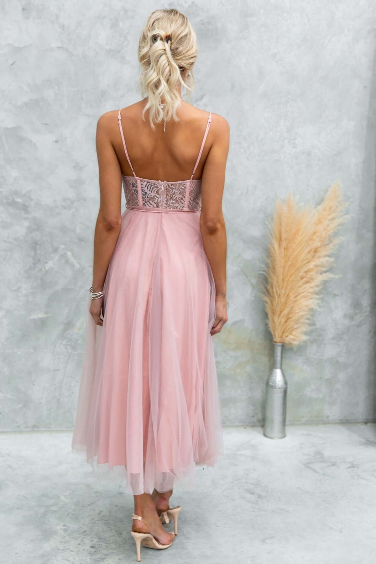 Back view of Wash Away Maxi Dress showcasing tulle fabric, lace detail, and adjustable straps in soft pink.