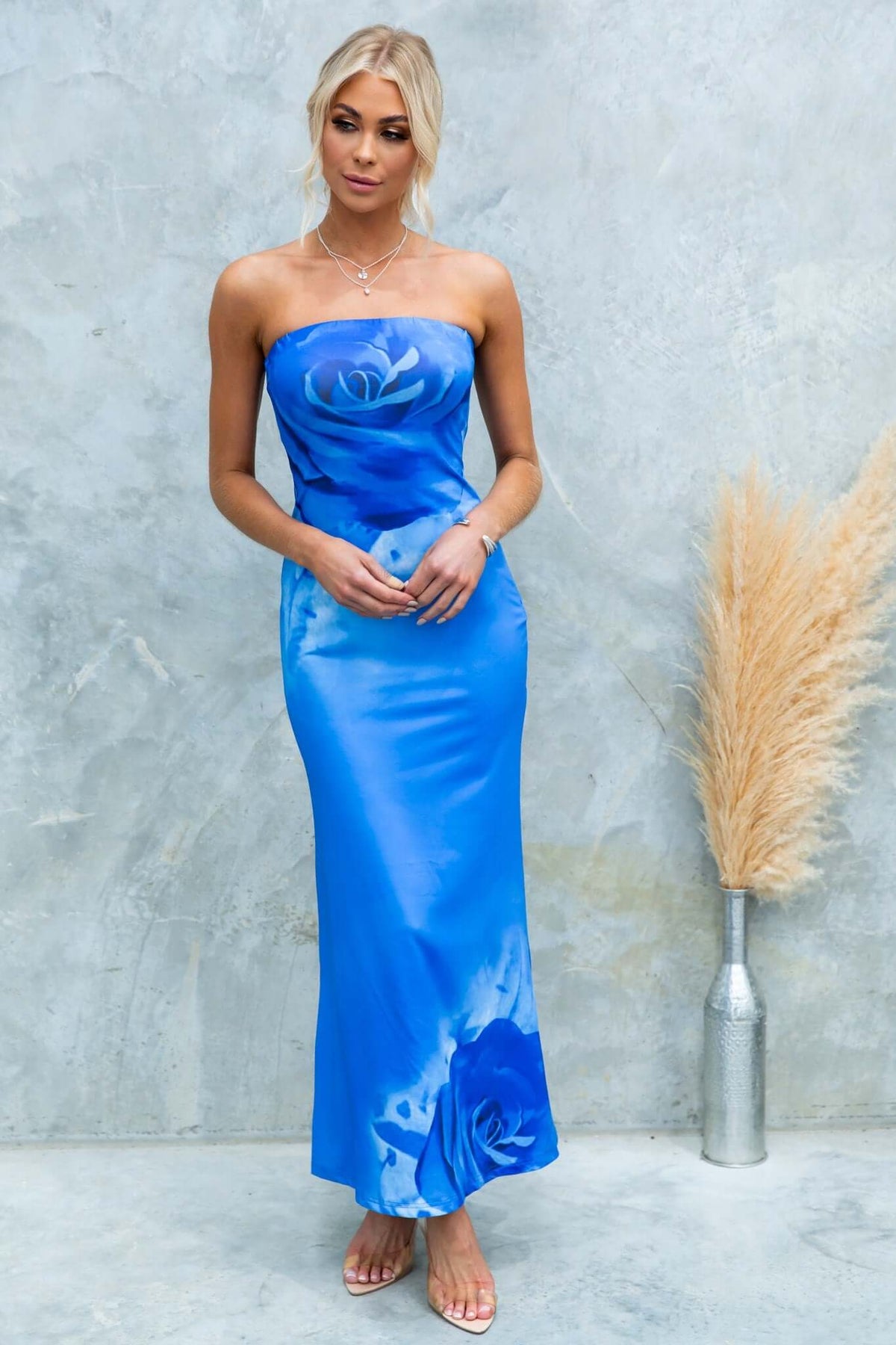 Dyxon Maxi Dress in vibrant blue with strapless design and floral print, perfect for a stylish summer look.
