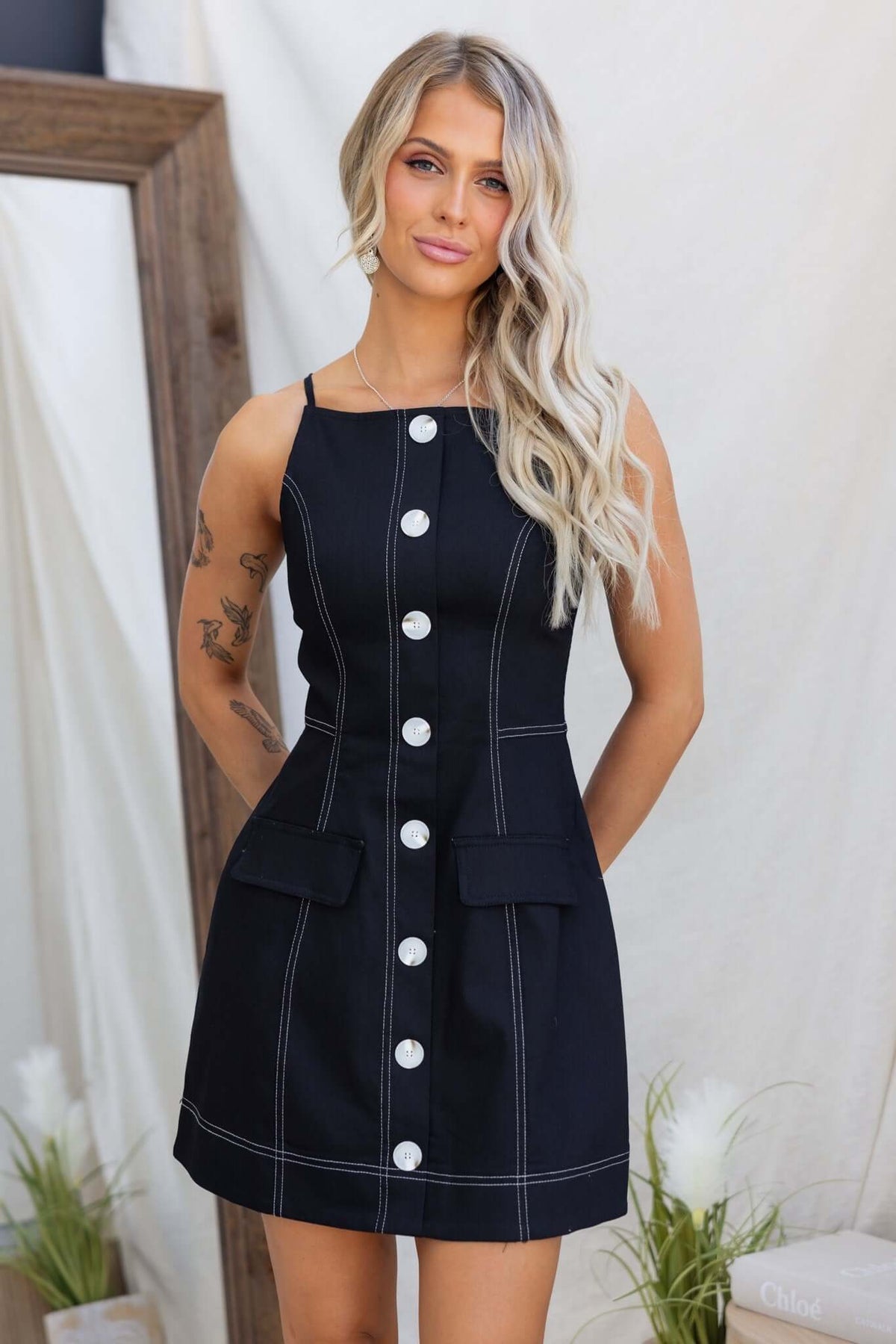 Olean Dress featuring faux buttons, invisible zip, faux pockets, and a stylish cotton blend fabric.