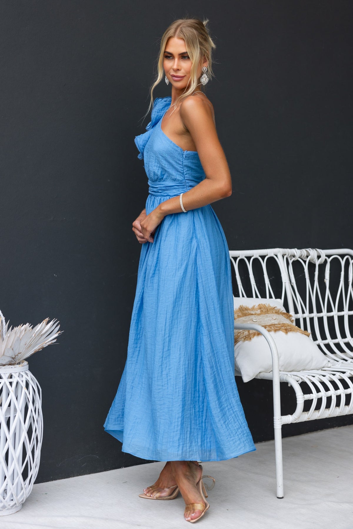 Etsa Maxi Dress featuring a one-shoulder neckline and ruffle, styled in a blue chiffon fabric, perfect for summer.