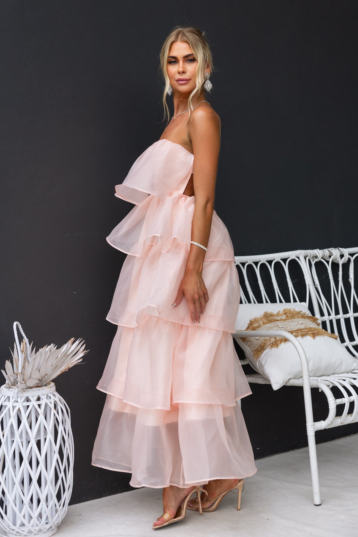 Strapless Lilianna Maxi Dress in soft peach with tiered chiffon layers, featuring a stylish back zip and anti-slip support.