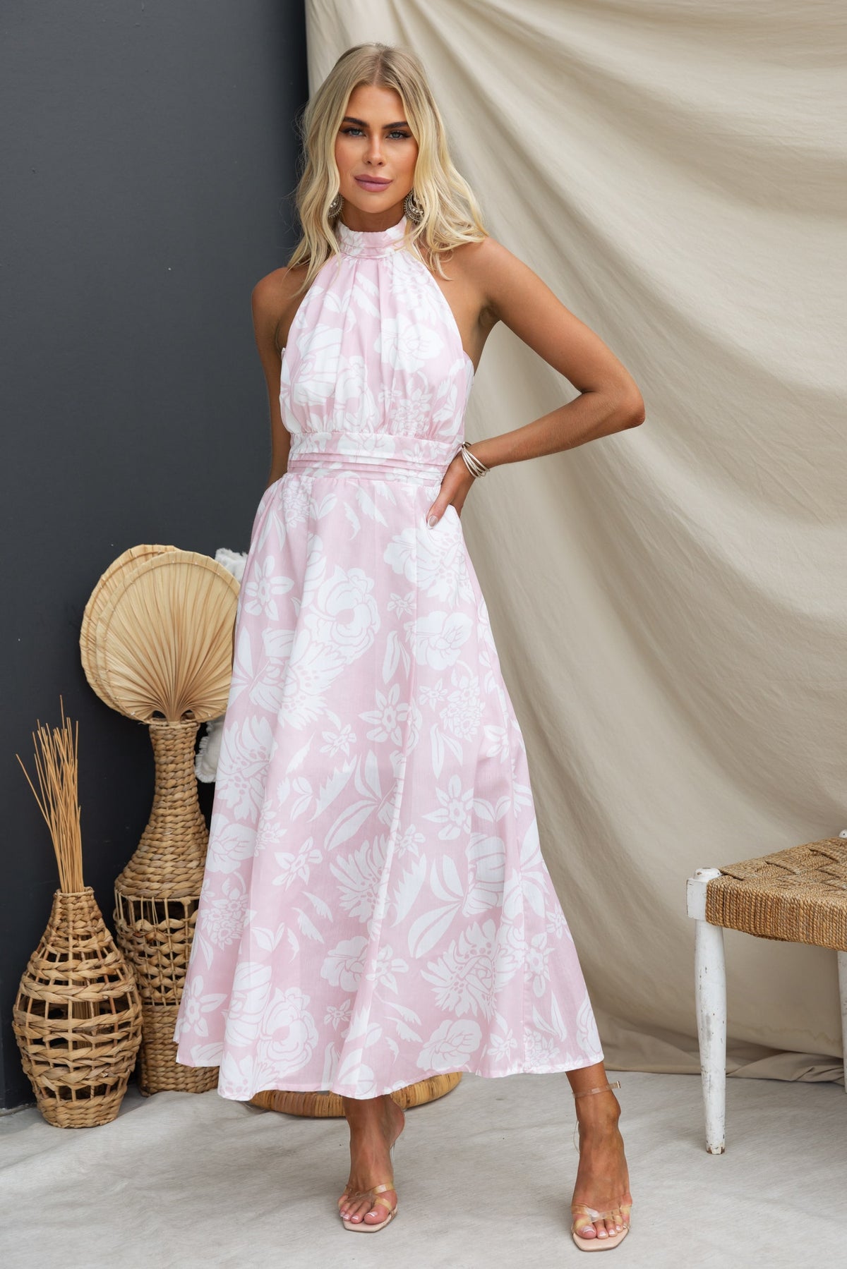 Floral print Corio Midi Dress featuring adjustable tie halter neckline and lightweight cotton fabric.