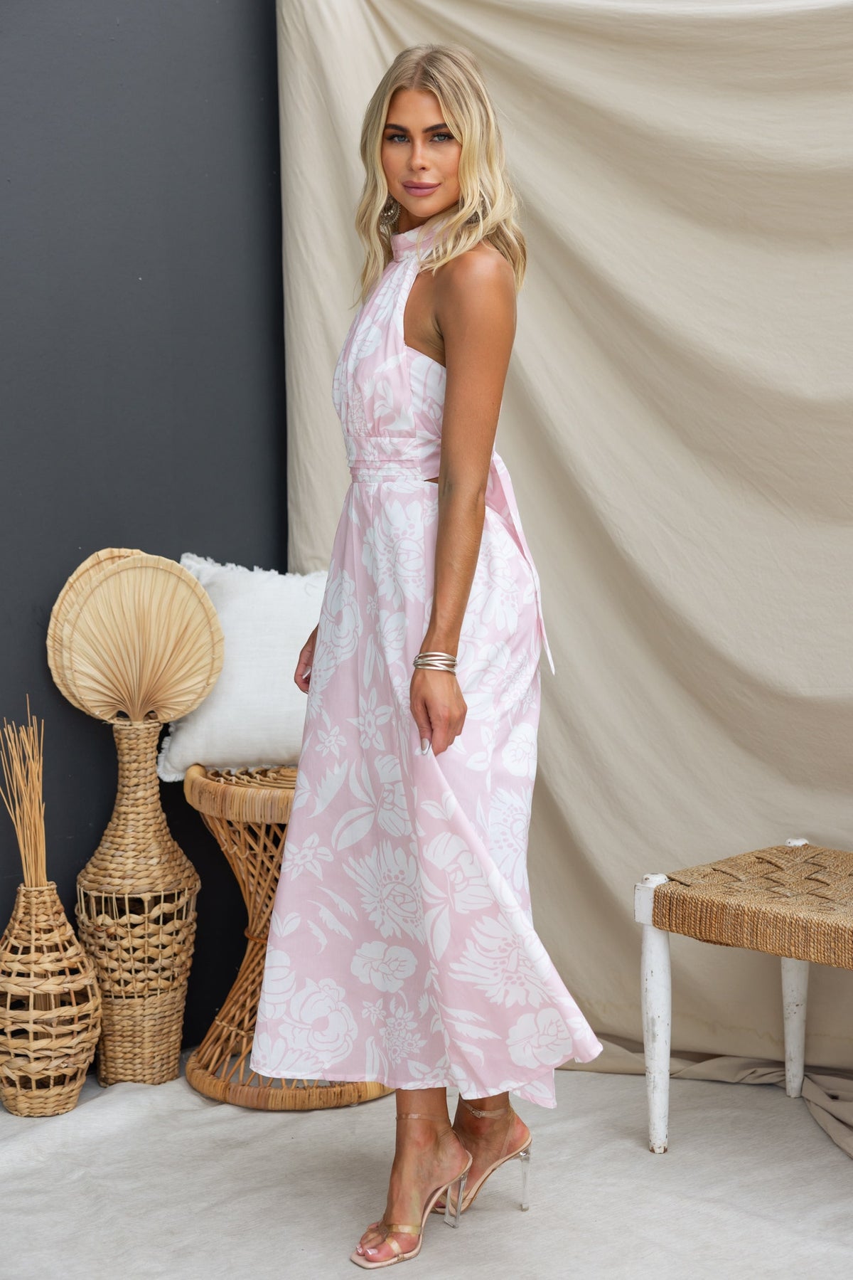 Floral print Corio Midi Dress with adjustable tie halter neckline and elastic back, styled in a light cotton fabric.