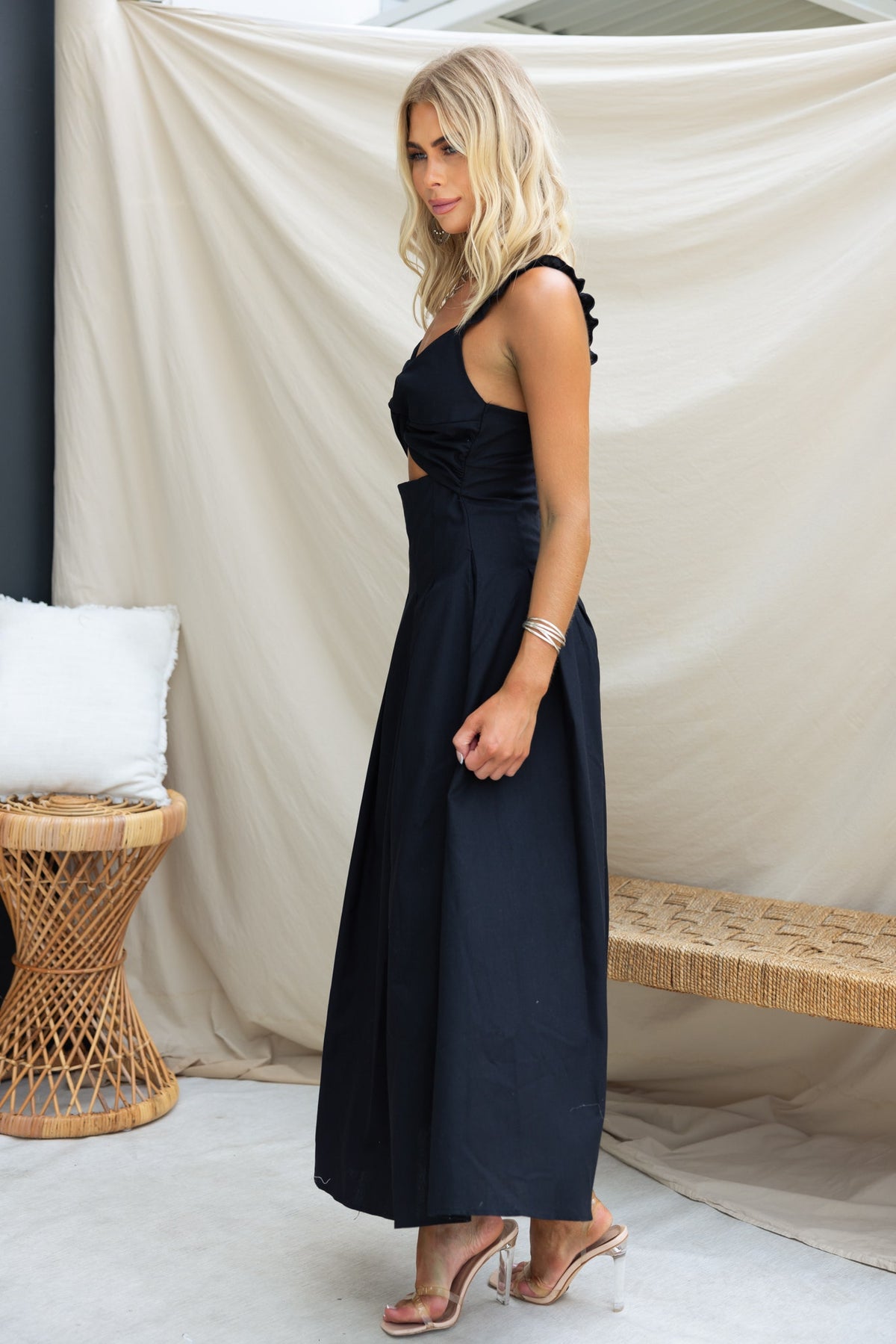 Elegant black linen blend Nerida maxi dress featuring a twist detail and cut-out under the bust.