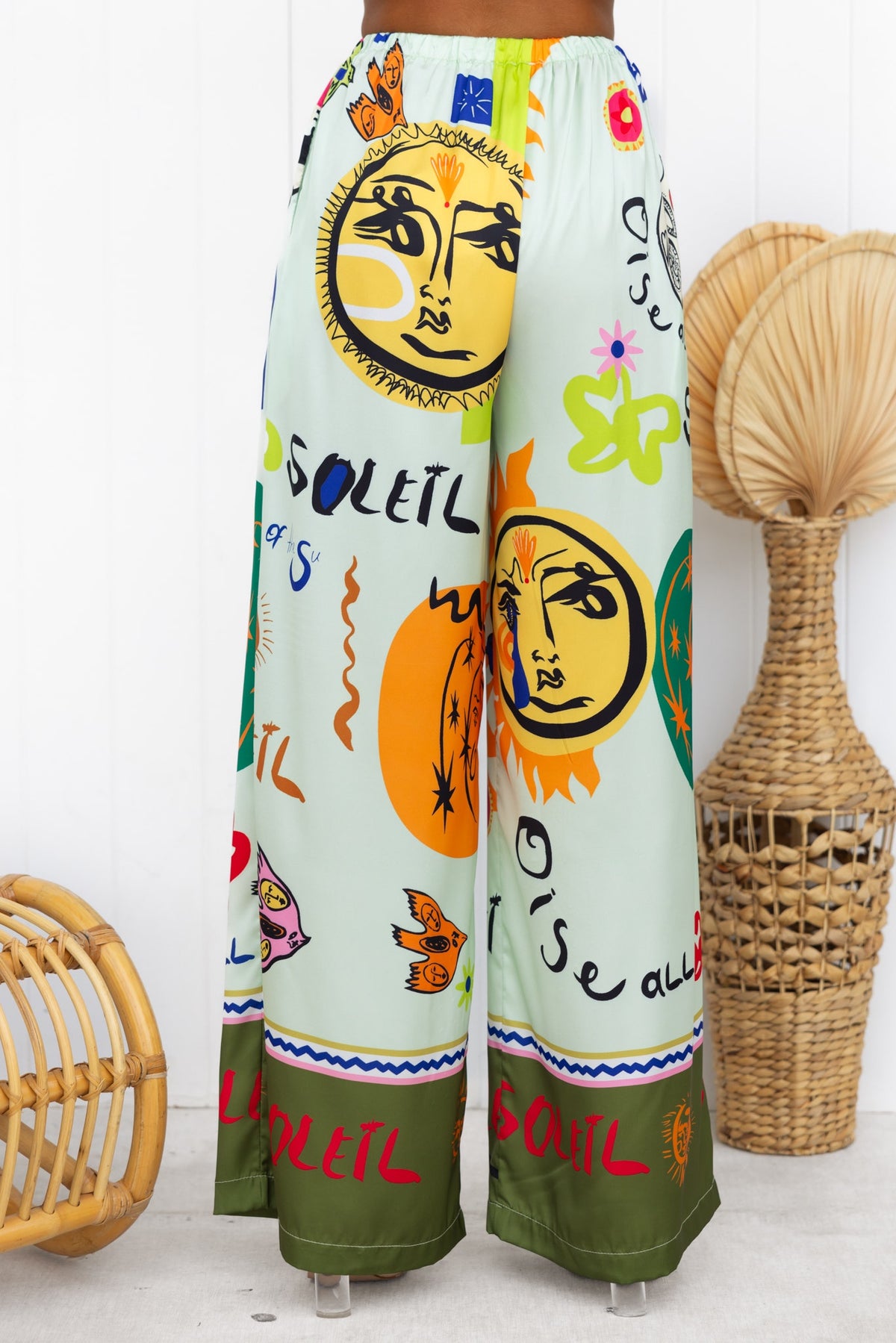 Colorful abstract print up all night pants with mid-high waist and elastic waistband, perfect for a stylish casual look.