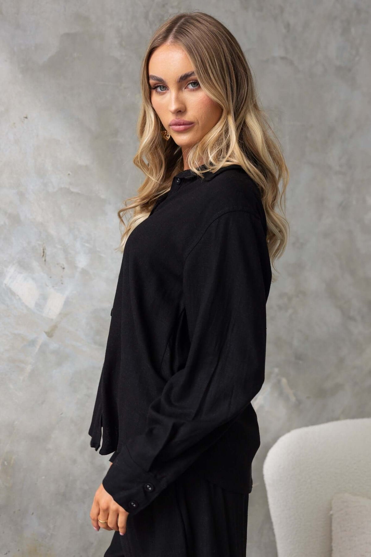Umali Shirt in black, button-up design with relaxed fit, perfect for summer wear.