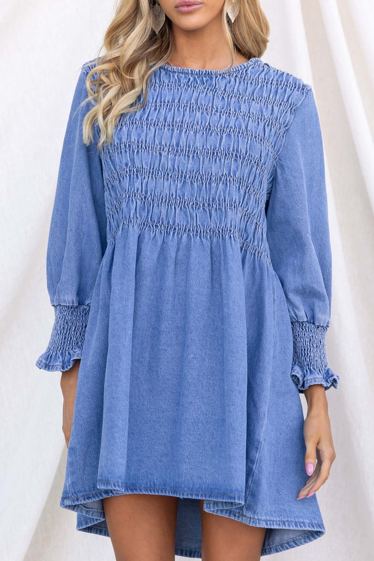 Tulsa Denim Dress featuring a smocked bodice, long sleeves, and relaxed fit, perfect for summer outings.