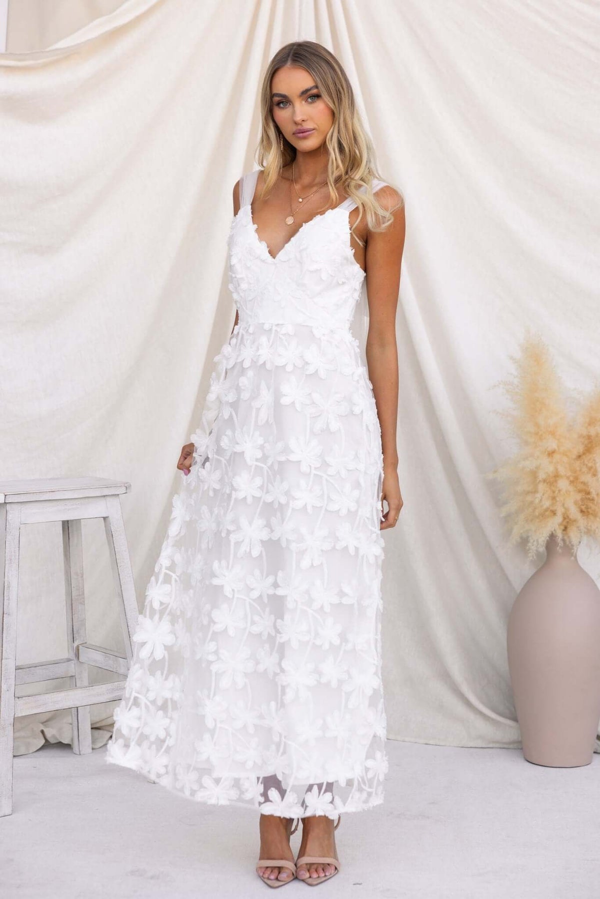 Xaria Maxi Dress in white with tulle embroidered flowers, featuring tie straps and fitted zip back.