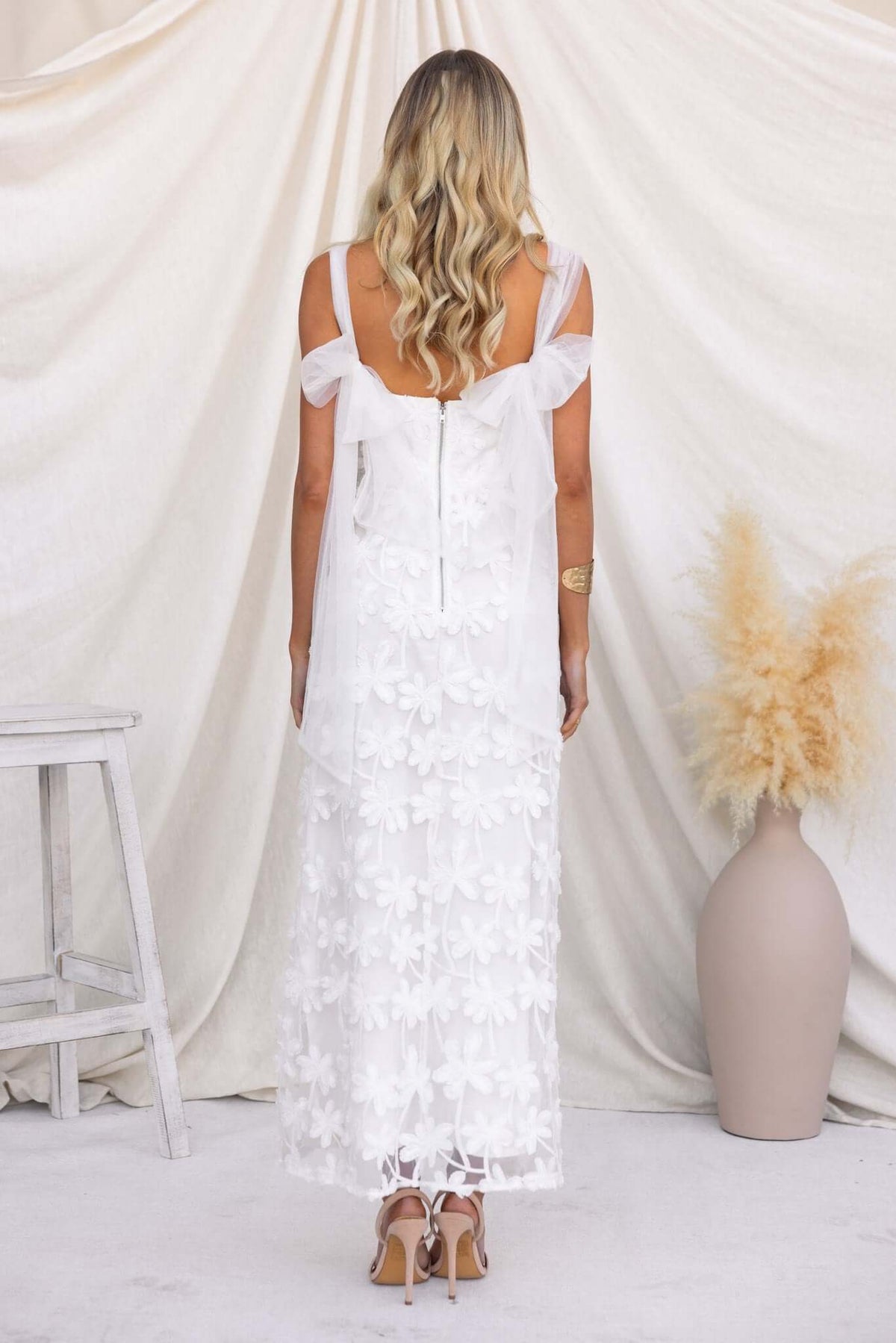 Back view of Xaria Maxi Dress featuring tulle embroidered details and tie straps, perfect for summer occasions.
