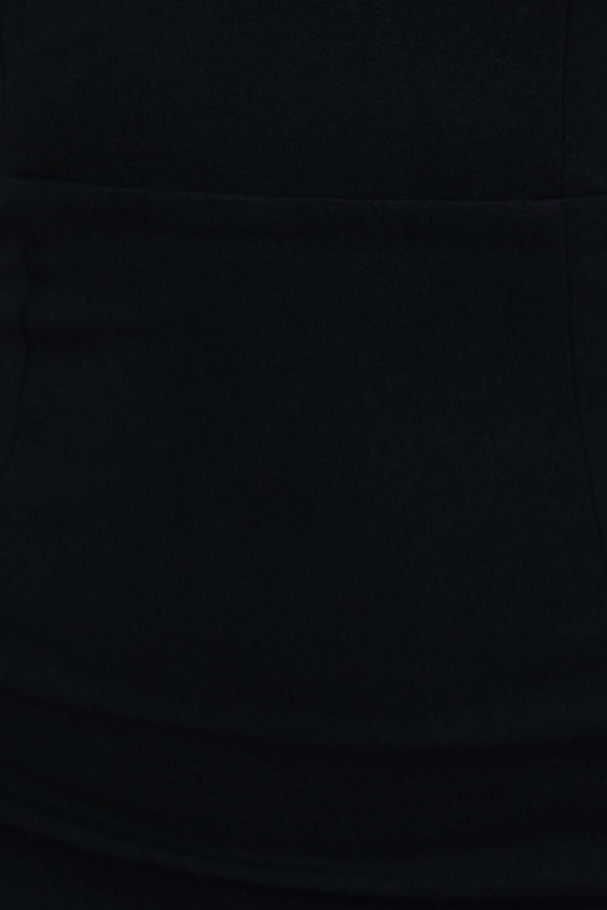 Close-up of the black fabric texture of the Stresa Midi Dress, showcasing its soft and stretchy material.