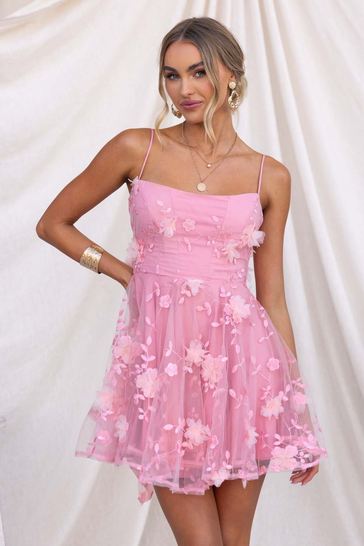 Oh Please Dress in pink lace/tulle with floral embellishments, featuring adjustable straps and boning, perfect for summer.