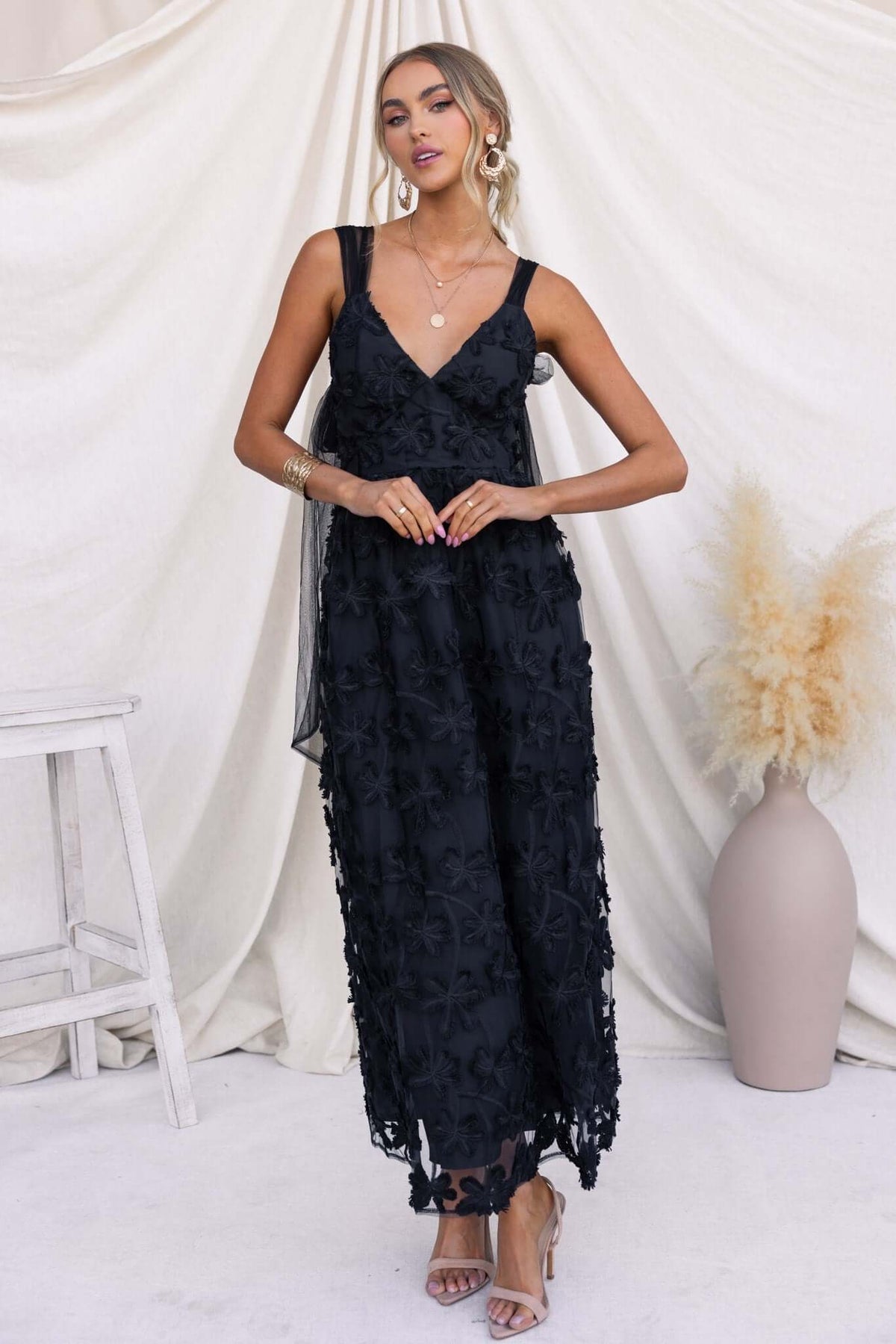 Xaria Maxi Dress in black with tulle embroidery, featuring tie straps and a back zip, styled for summer.
