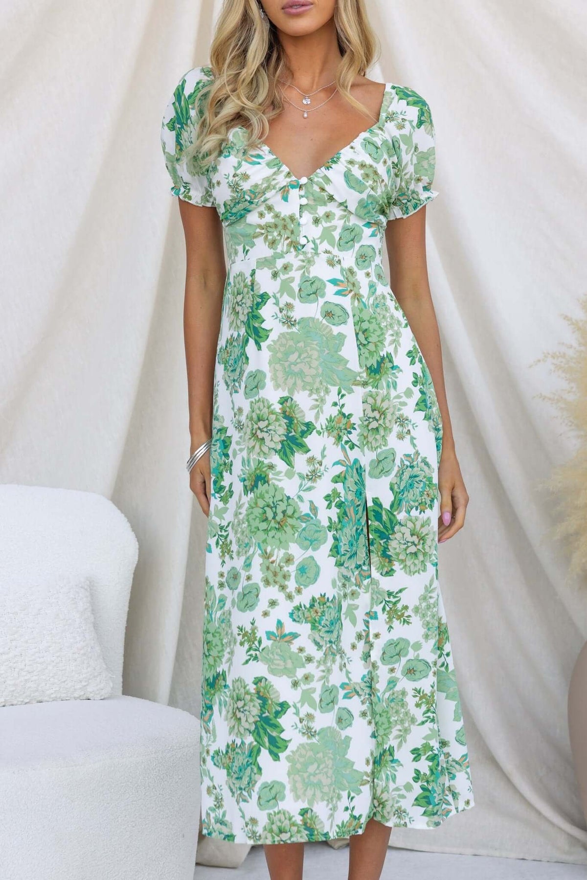 Eternal Gold Midi Dress with floral print, featuring puff sleeves, button-up front, and front slit. Perfect summer outfit.