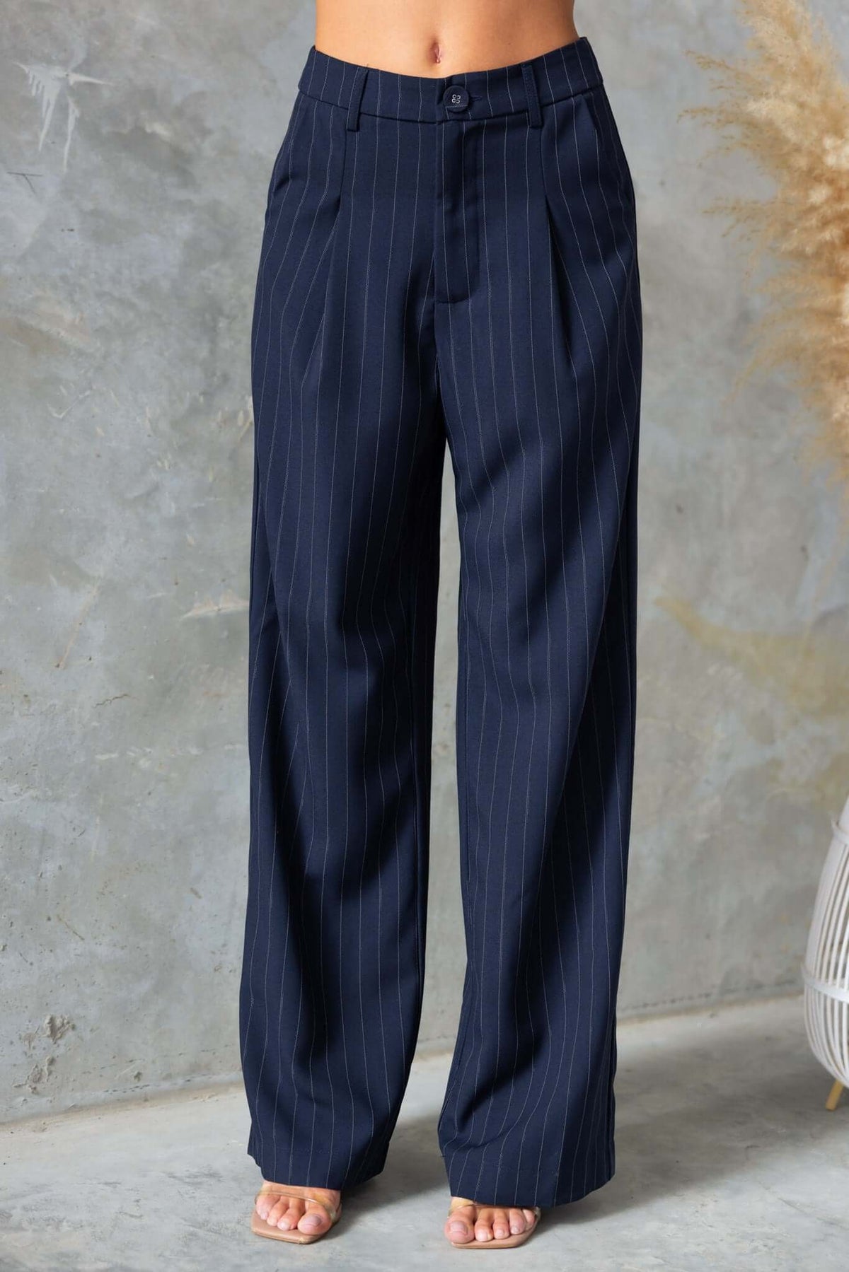 Renton Pants in navy with pinstripes, featuring a mid-high waist fit and wide legs, perfect for summer.