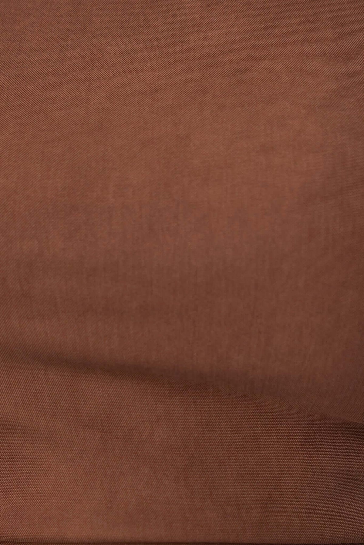 Close-up of soft brown fabric demonstrating smooth texture ideal for Savona Midi Dress.