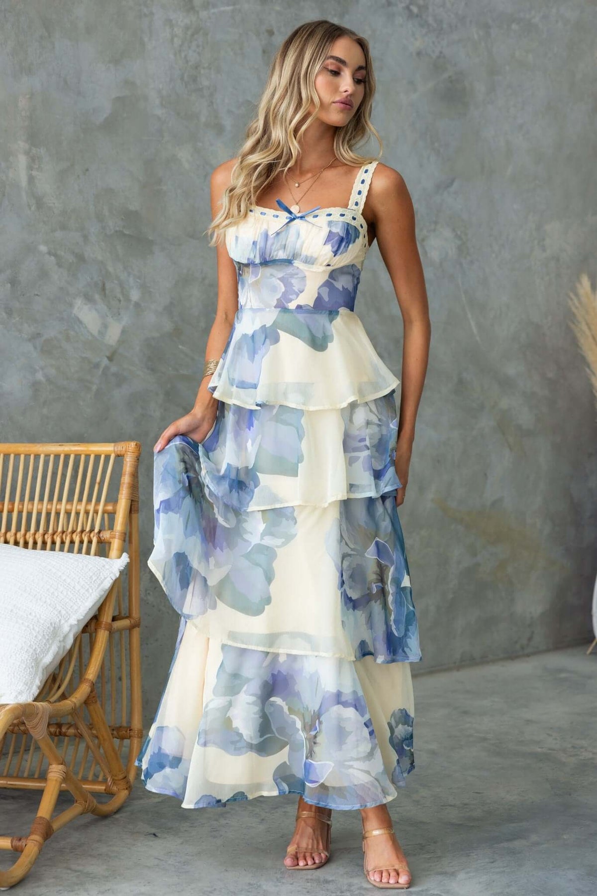 Peyton Maxi Dress featuring adjustable straps, lace detail, and a multi-tier ruffle skirt in floral chiffon.