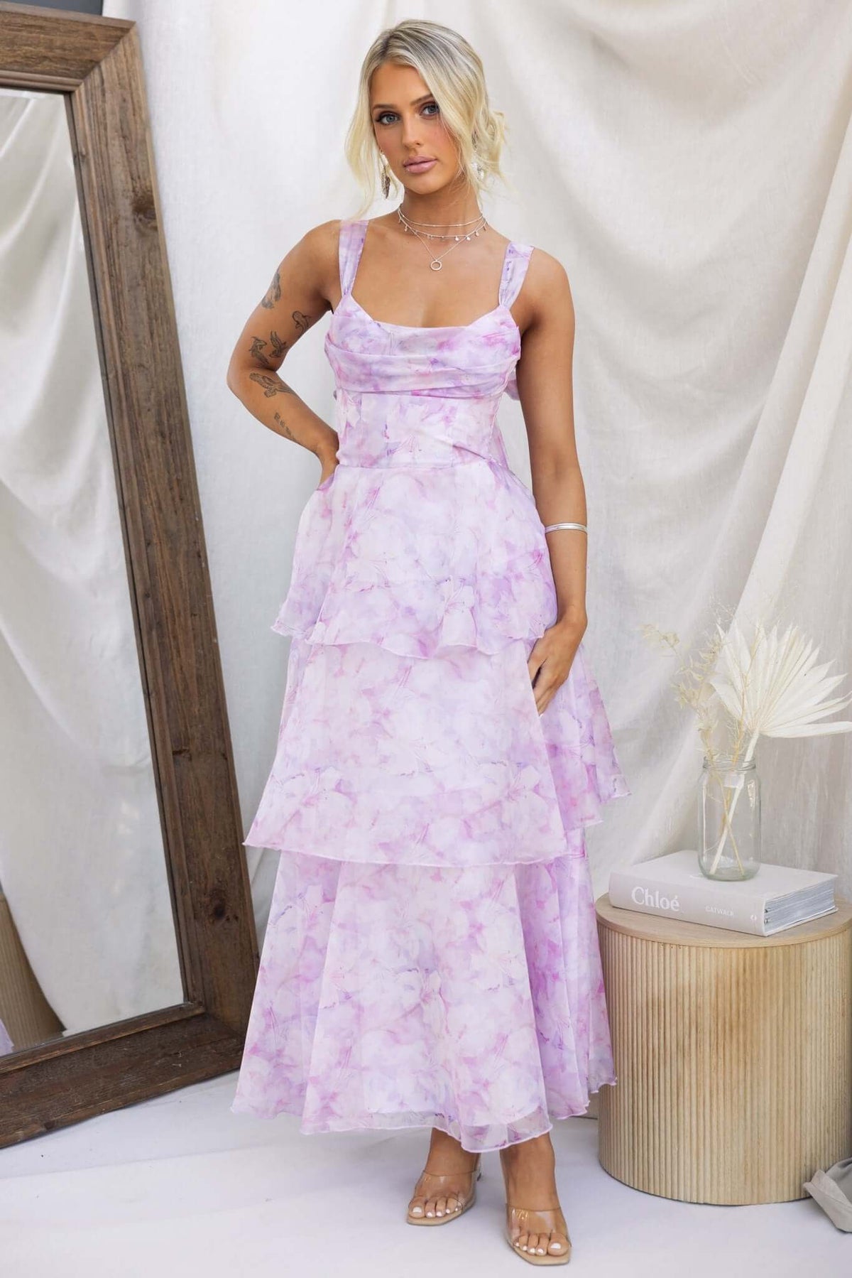 Bennett Ave Maxi Dress featuring tiered frills, lightweight fabric, and stylish neck tie, perfect for effortless elegance.