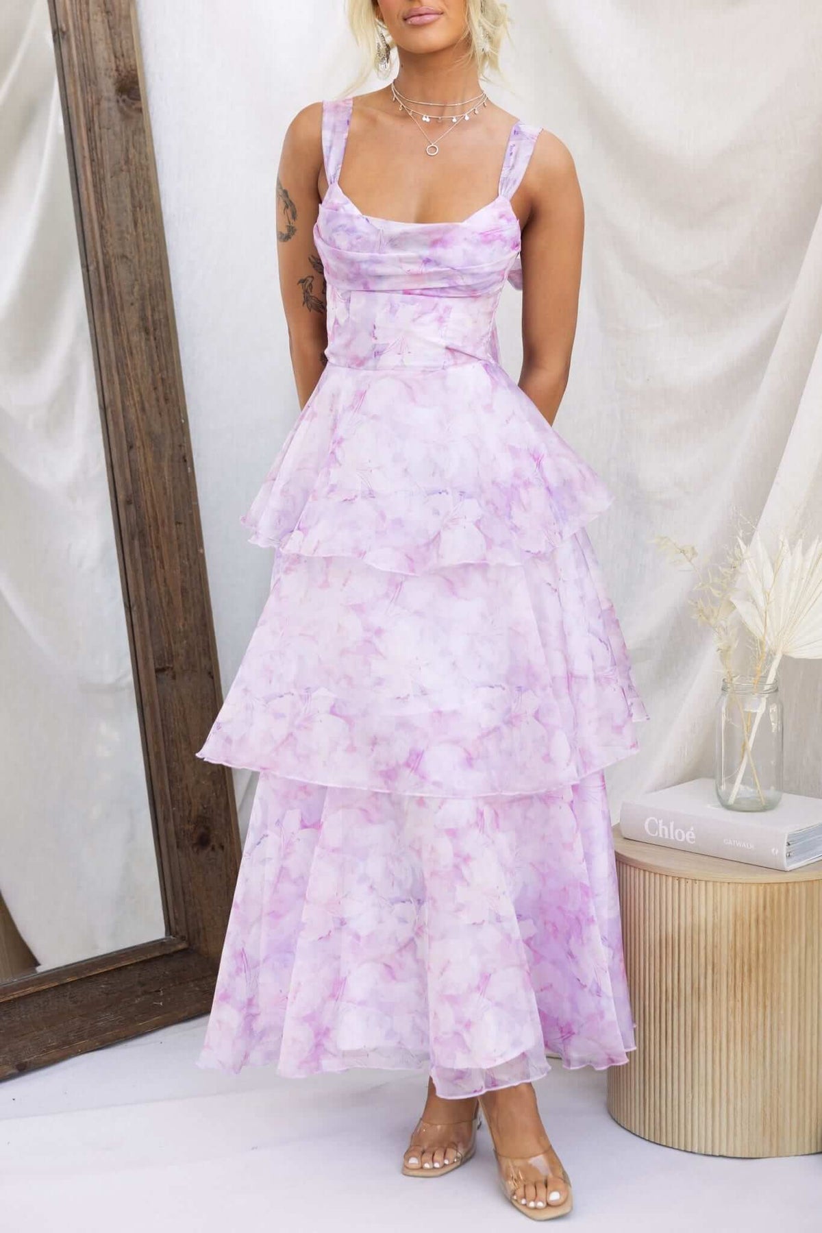 Bennett Ave Maxi Dress featuring tiered frills and lightweight fabric in soft pink and purple hues, perfect for summer occasions.
