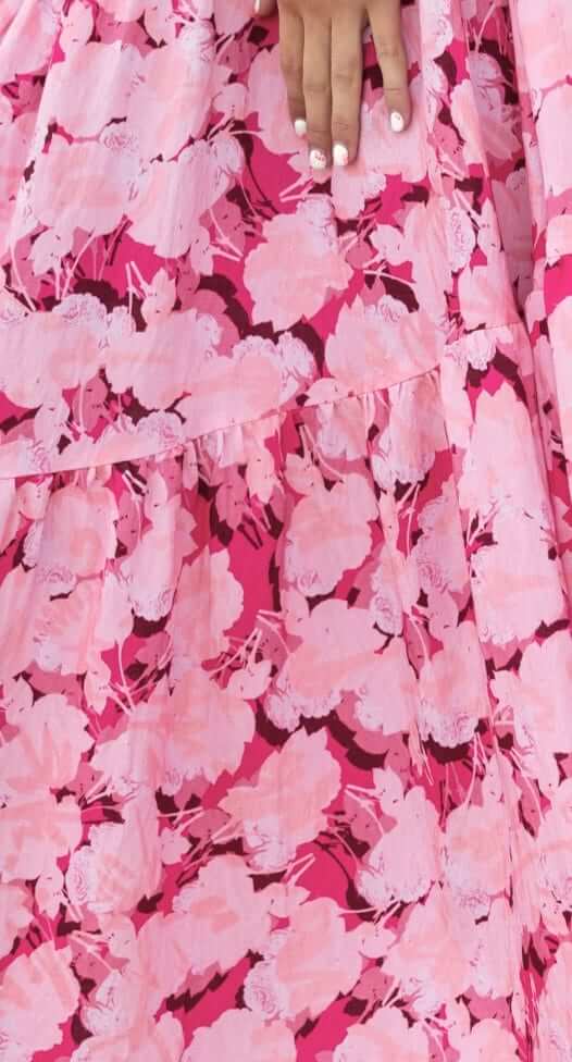 Close-up of the Peachy Days Maxi Skirt with pink floral pattern and layered design, showcasing the fabric texture.