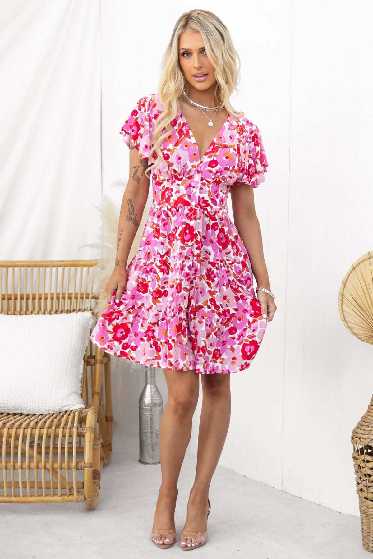 Hope filled mini dress featuring a floral print, short sleeves, and a flattering fit, perfect for summer outings.