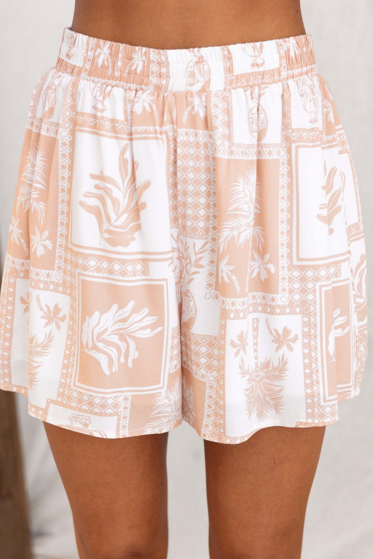 Lightweight Lazy Sunday Shorts with floral pattern and elastic waist, perfect for casual summer wear.