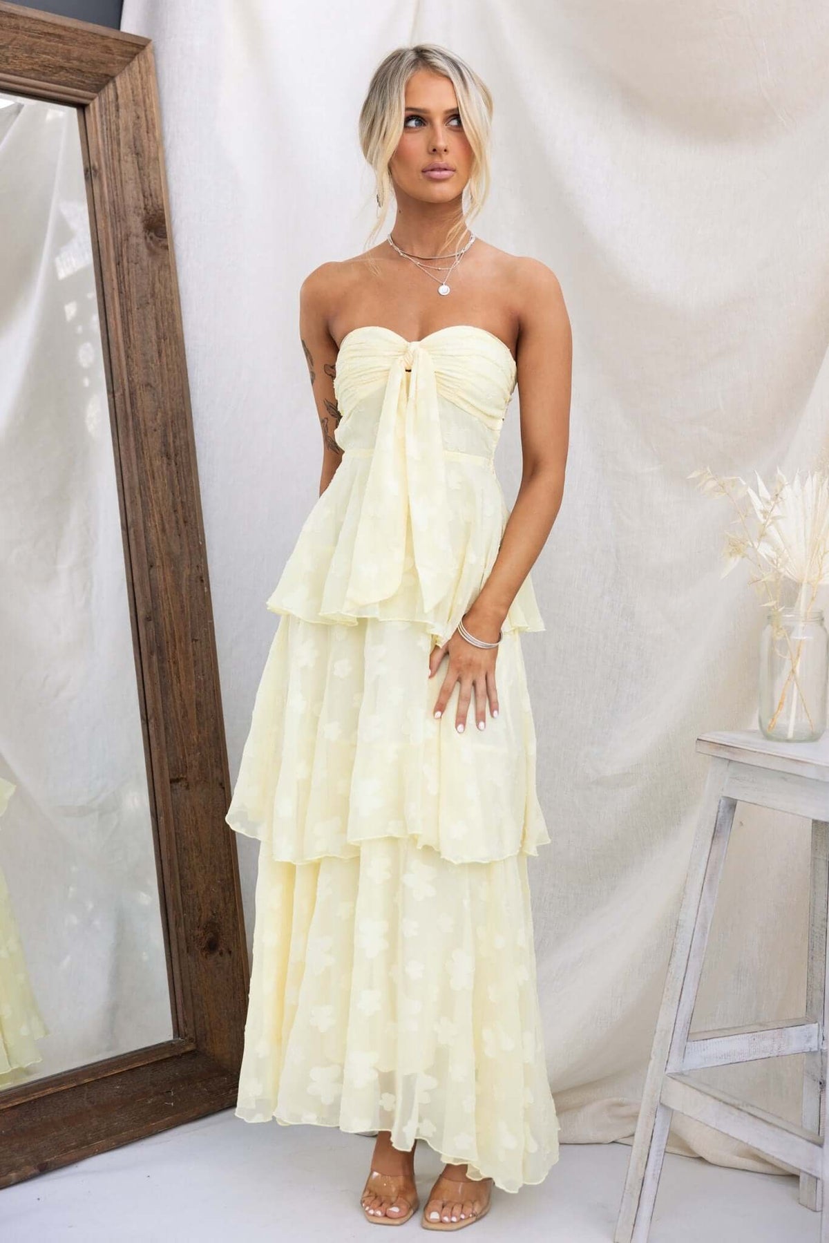 Soft Whispers Maxi Dress in light yellow with tiered ruffle skirt and removable tie, perfect for summer occasions.