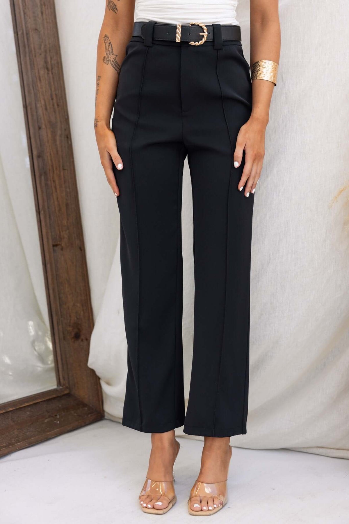 Columbus Pants in black, mid-high waist, non-stretch, tailored fit, model wearing size 6/XS, stylish outfit view.
