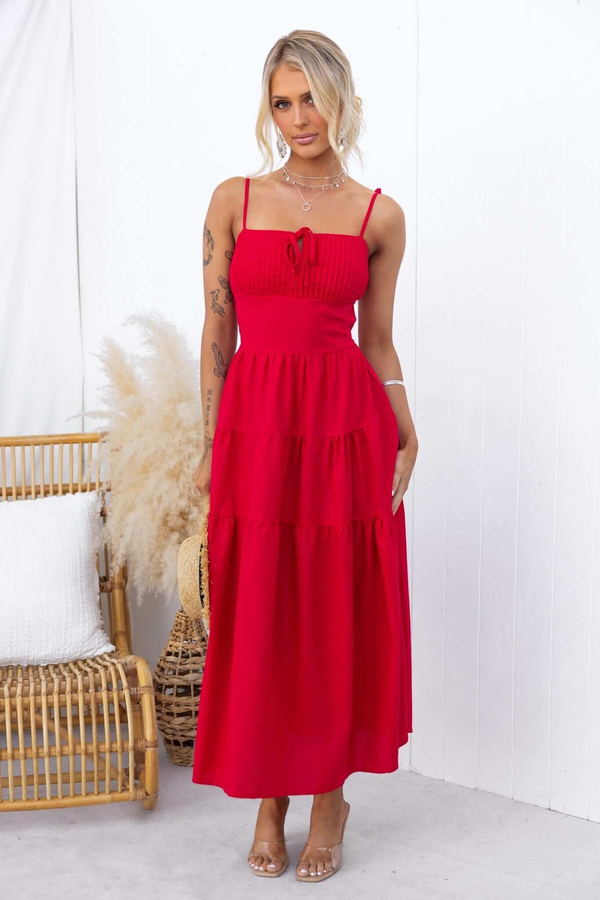 Gresham Maxi Dress featuring thin tie straps, elastic back, split sides, and a vibrant red color.
